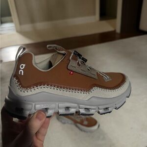 On Running Women’s Tan and Gray Sneakers